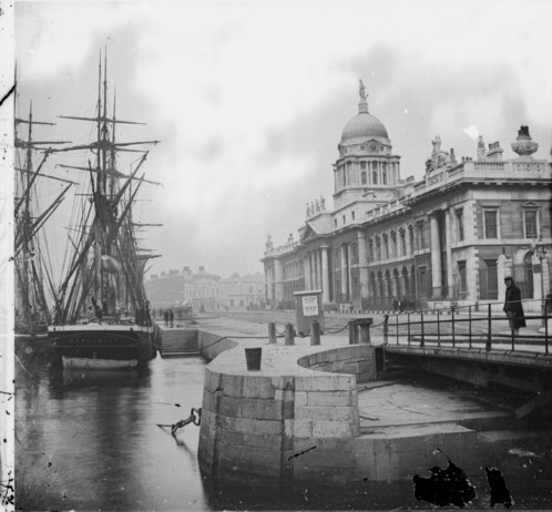 The sailing ship S.S. Adolphine moored at the Custom House in Dublin, Ireland, with a swivel bridge in the foreground. There are posters advertising Pleasure Trips to Lambay Island. c1880. The National Library of Ireland. No known copyright restrictions.