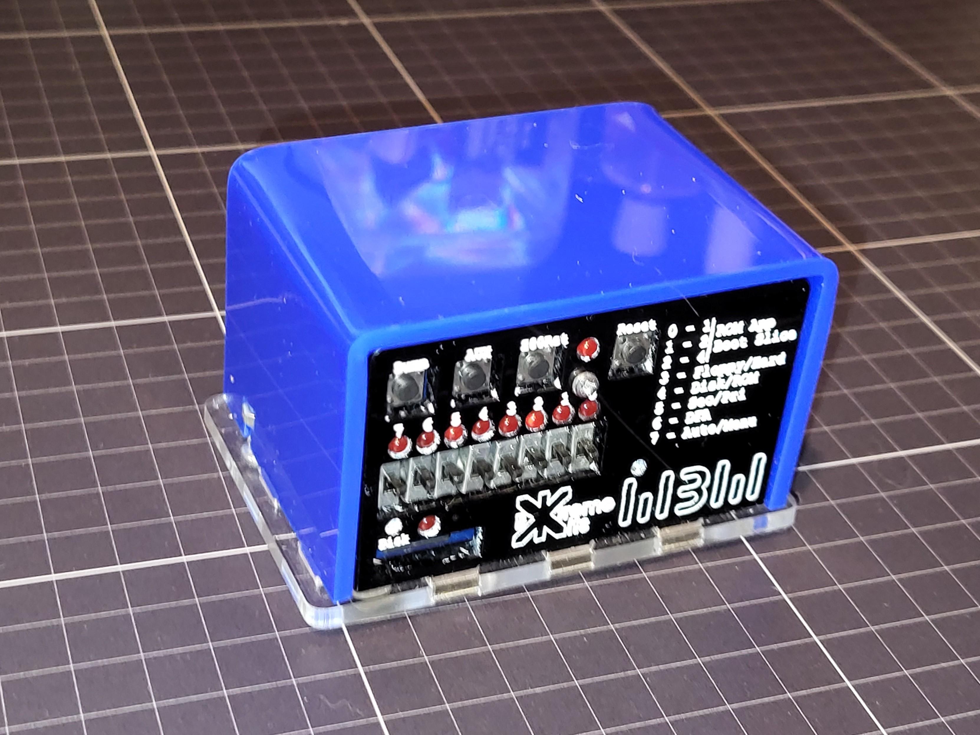 An Extreme Kits Pico RomWBW Z80 CPM Computer.

An electric blue box with a black front panel etched with white lettering and covered in switches and LEDs. It contains a Pi Pico that is emulating a Z80 CPU and Ram/ROM, allowing it to run, among other things, CPM 2 and 3.