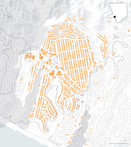 Black and white map with buildings that have been damaged or destroyed coloured orange. Block after block of houses have been completely wiped out as has the local high school and several commercial buildings
