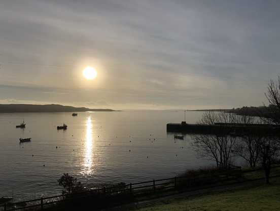 A “serene sunrise” along Schull Harbour in West Cork, Ireland with its reflection stretching out towards Cape Clear Island & Sherkin Island! 