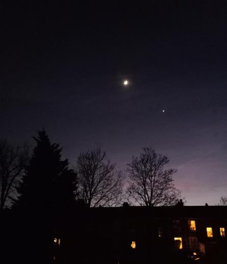 Evening sky with moon & a star.