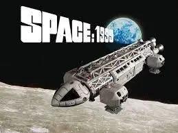 Space:1999 intro showing the Eagle Transporter over the moon with the gibbous earth in the background. 