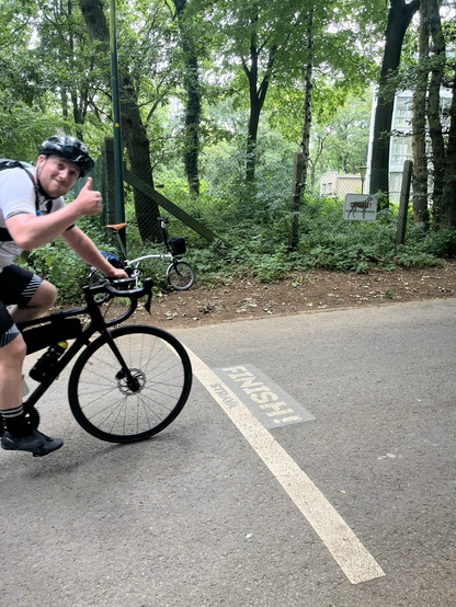 A rider reaching the top of the Kemmelberg in Belgium 