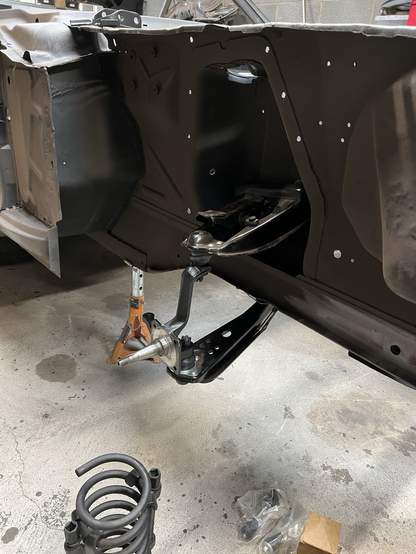 Upper arm, lower arm and spindle bolted back on (right side)