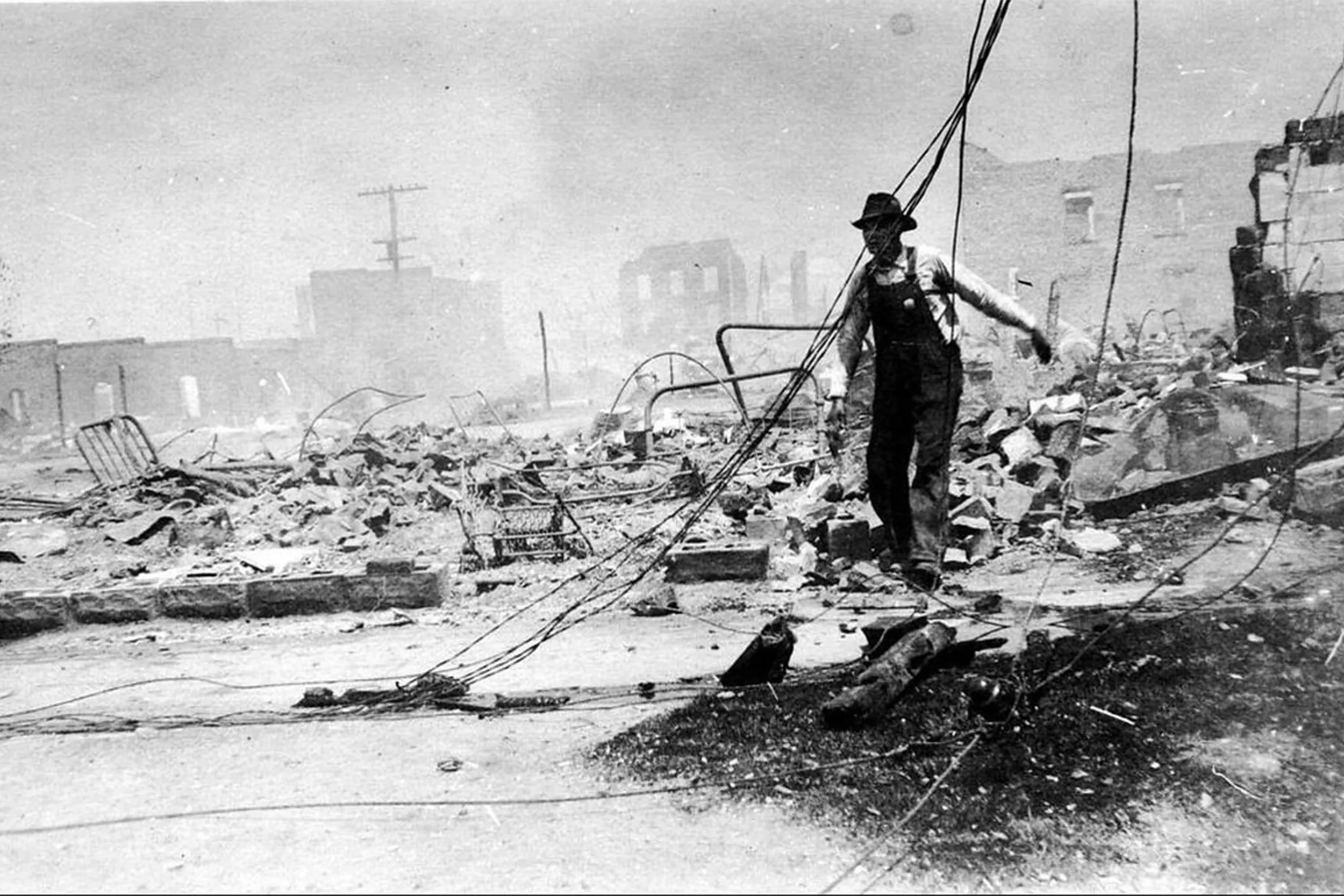 Tulsa’s Greenwood District in ruins in 1921 after a white mob razed the predominately Black community.