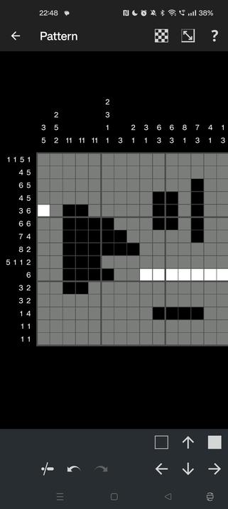A partially filled (early) nonogram grid in dark mode