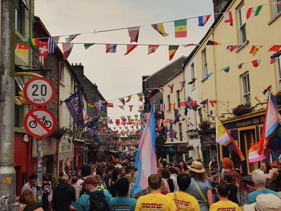 A photo of the Galway Pride Parade marching through the Latin Quarter