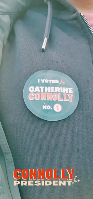 Denman Rooke walking and talking about voting for Catherine Connolly