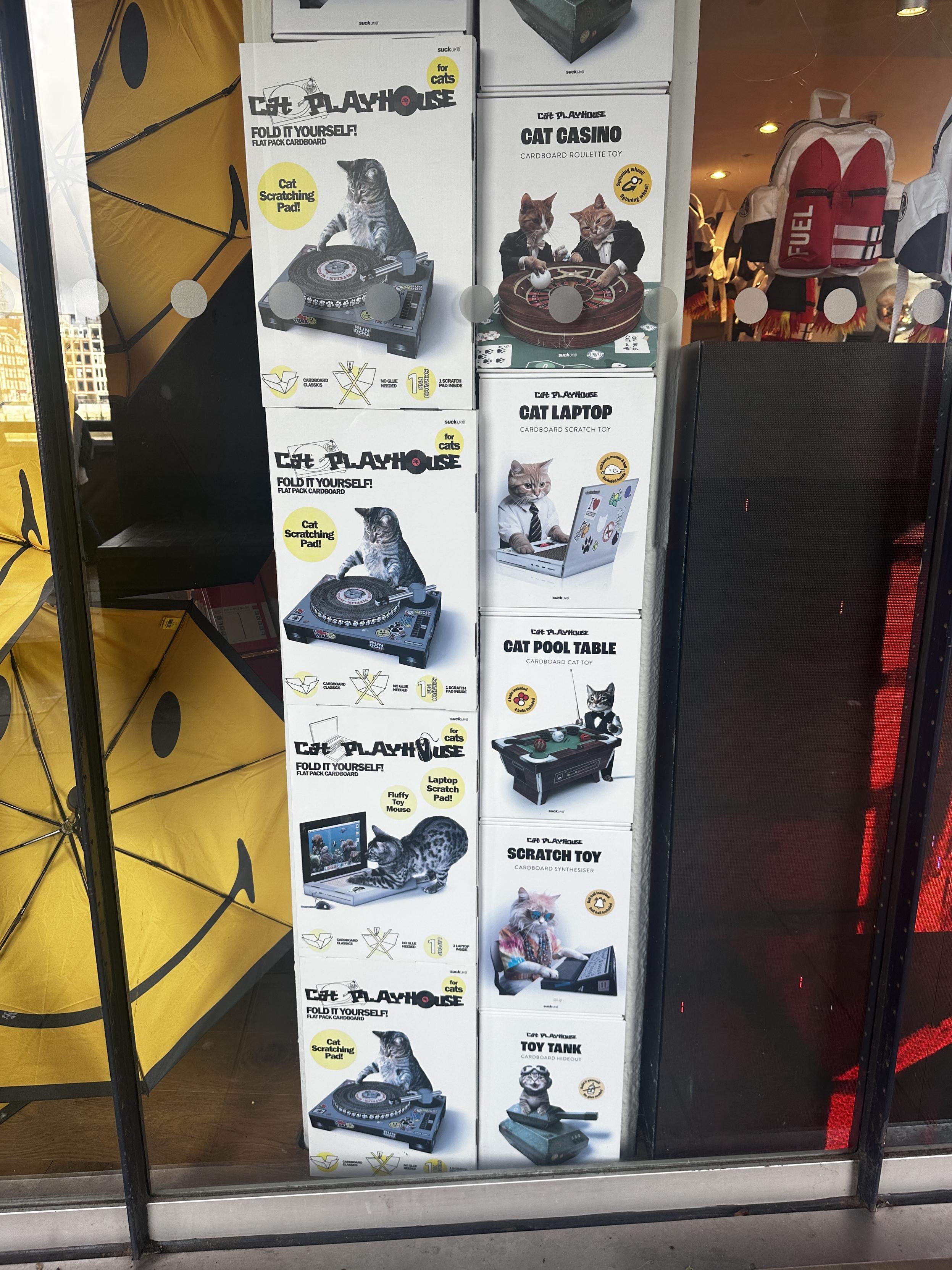 Boxes of cat toys in shop window