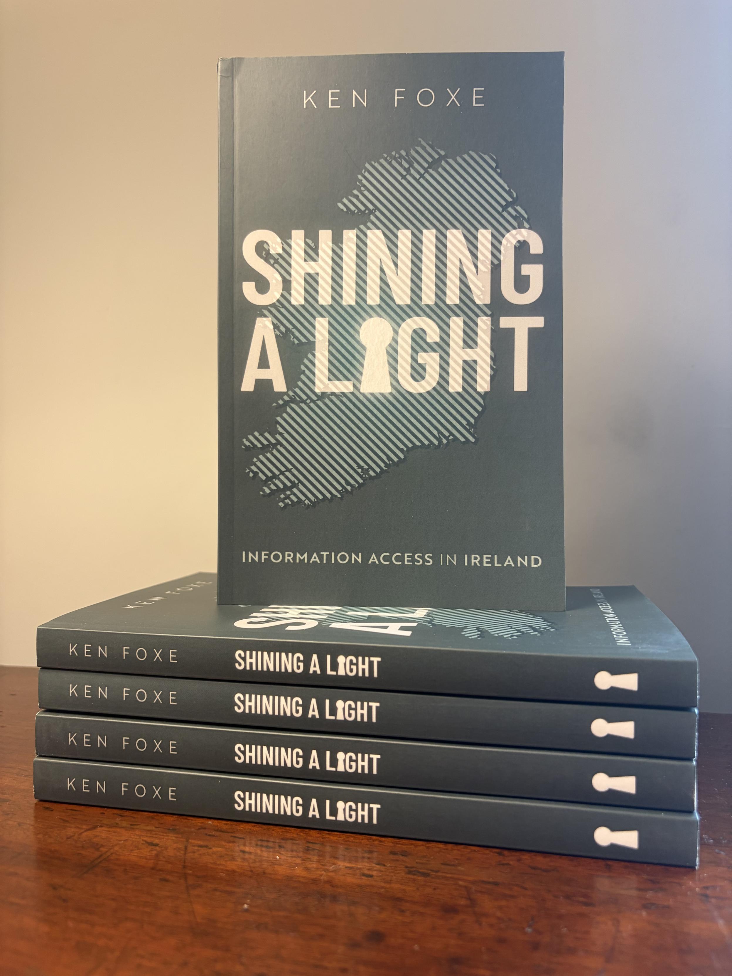 The cover of the book Shining a Light by Ken Foxe.