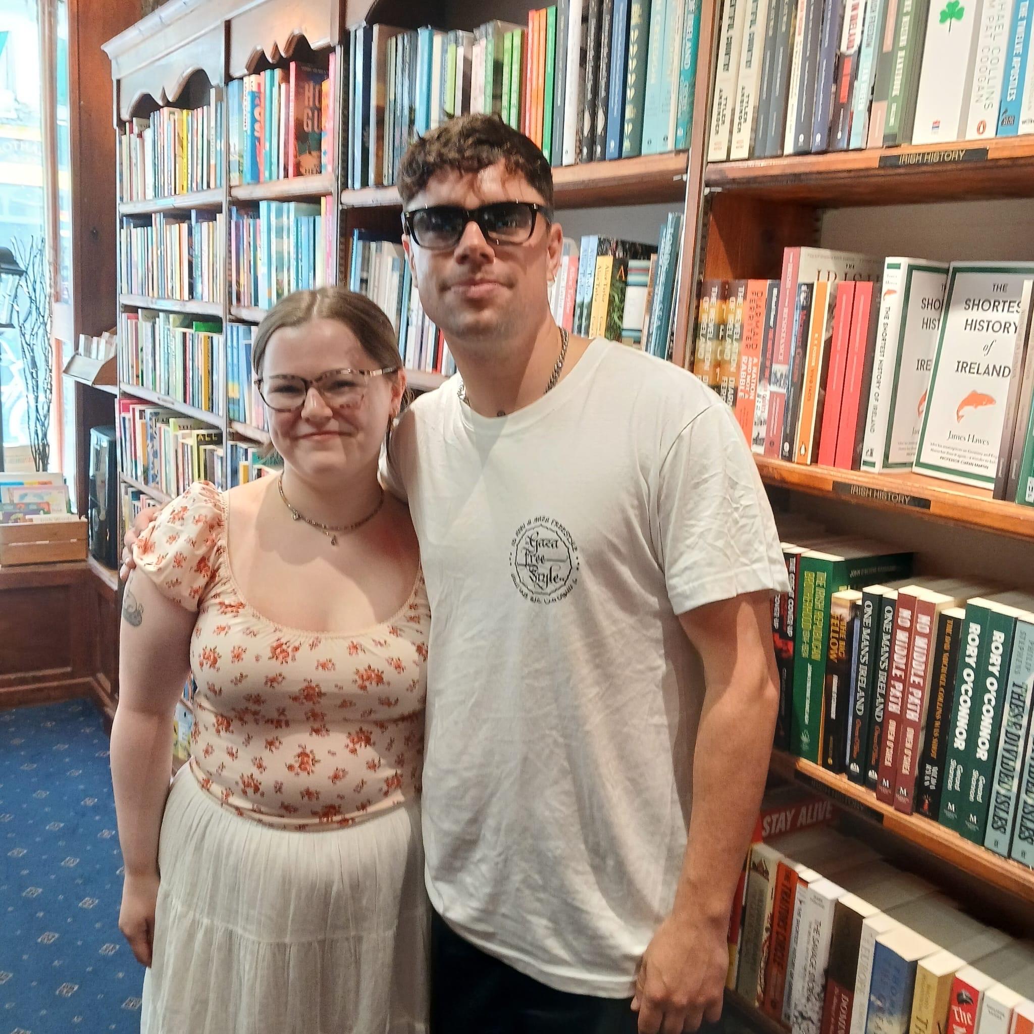 Naoise from Kneecap with Síofra standing in front of our Irish History section