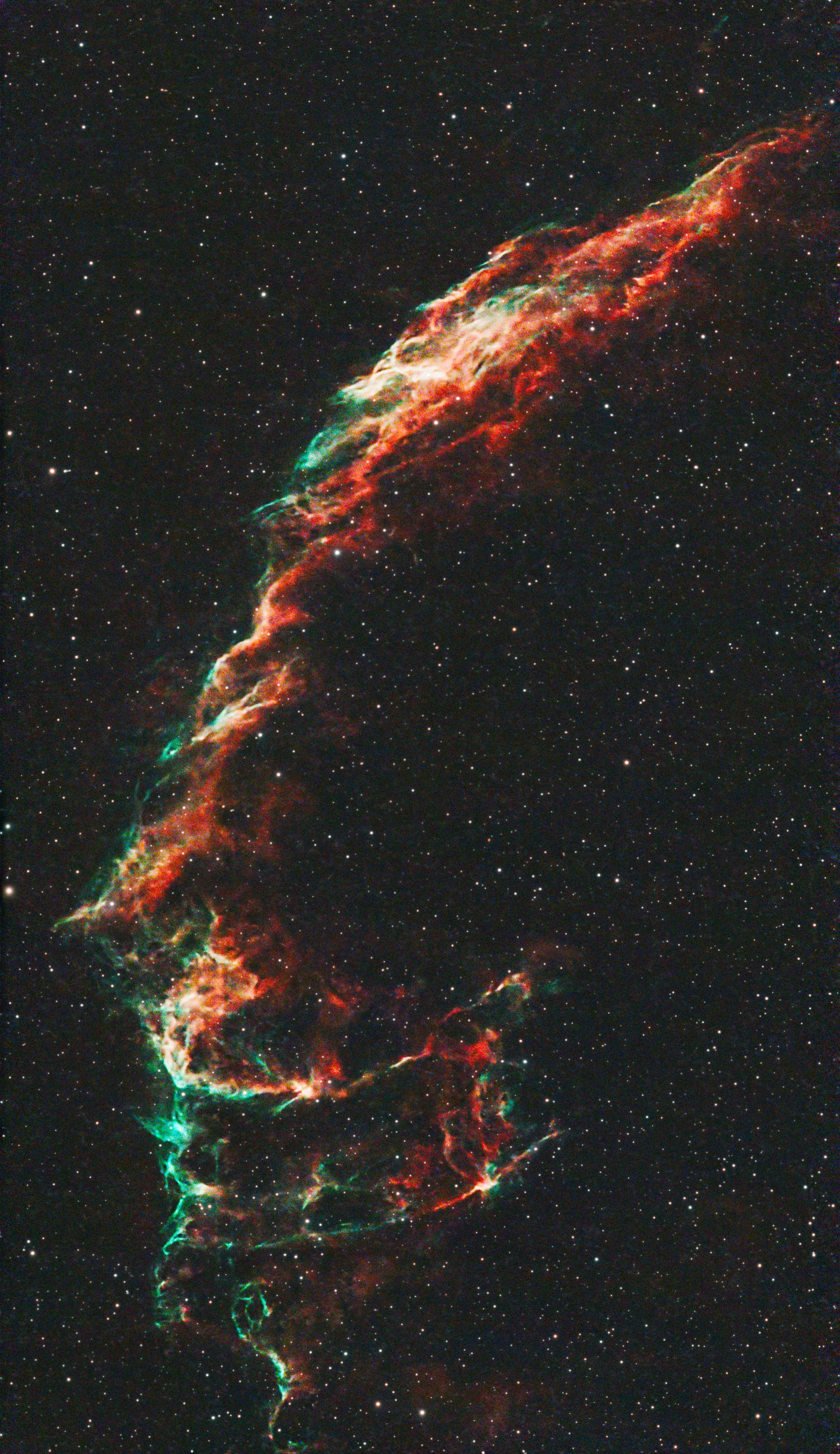 NGC 6992 - Eastern Veil nebula
Another part of the massive Cygnus loop, a 20,000 year old remnant of a supernova that lies about 1500 light years away in the constellation Cygnus. This halo of gas and dust emits light because it is electrically charged (ionised) by the resulting radiation from the supernova.