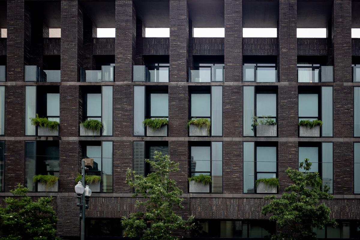 A street view of a multistorey building.