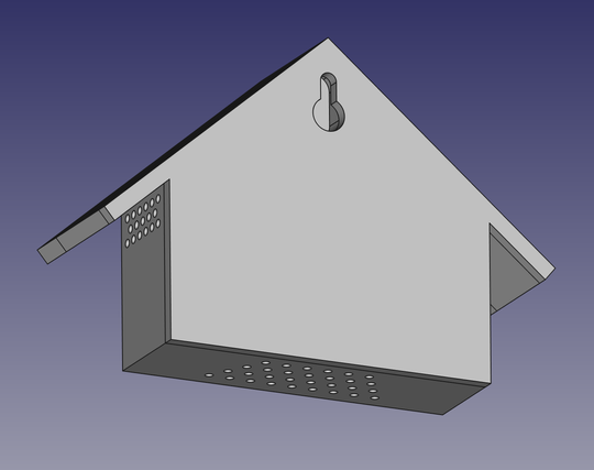 A view from behind shows a slot hole for hanging the enclosure on a screw. Vents are visible on the bottom and at the side where the roof overhang protects them from spray water. This should allow for a relatively good air ventilation.