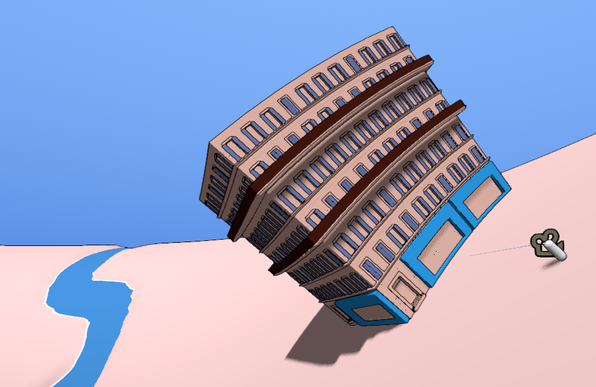 Building with two balconies, shops, and a river on the background