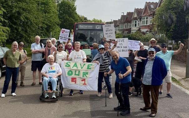 Tooting residents gathered with signs to protest changes to G1 bus service
