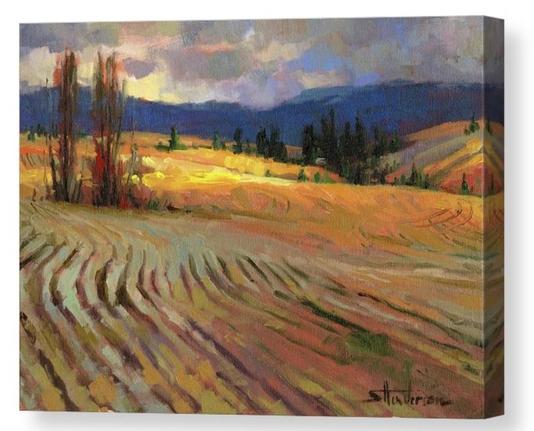 Canvas print of an original oil painting depicting a cultivated field near the mountains, under a cloudy sky.
