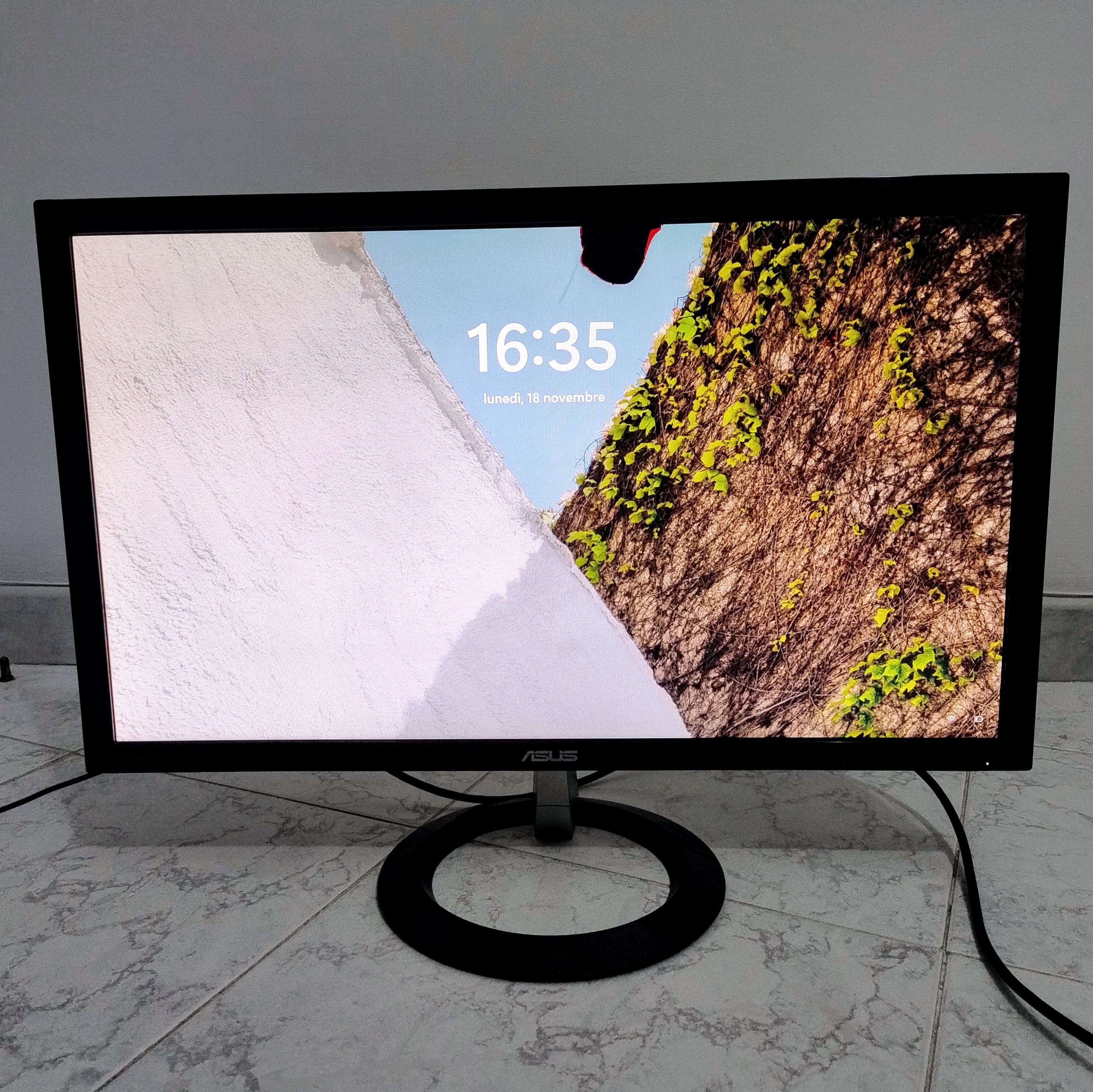 Monitor Asus con sfondo colorato