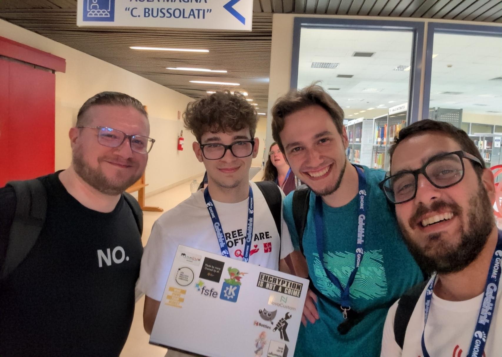 Photo of me and another friend of mine with Emmanuele Bassi and Niccolò Venerandi.