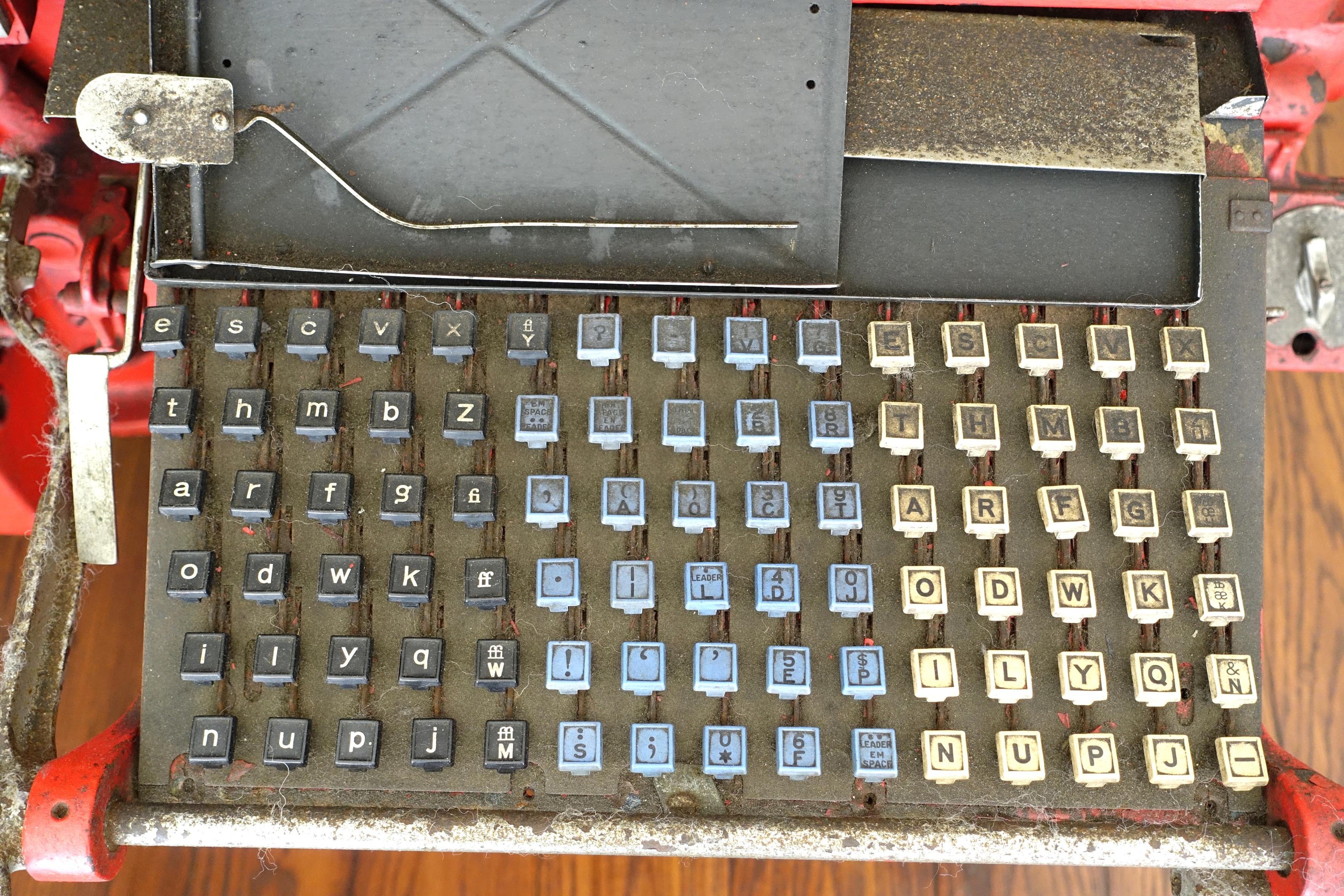 Linotype machine display outside the Washington Post entrance - Washington, DC, USA. This is a Mergenthaler Linotype Model 31, used at the newspaper from 1888 to 1980. Its design is old enough so that it is now in the public domain.