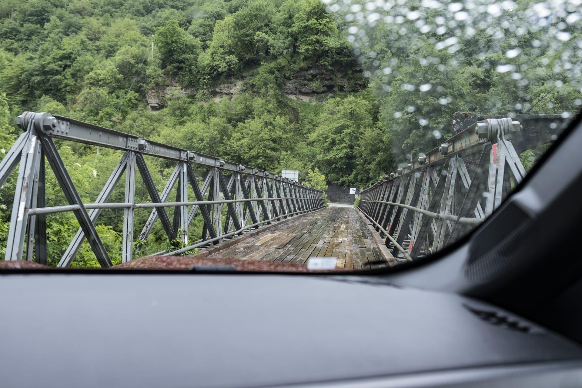 Narrow bridge with wood road surface