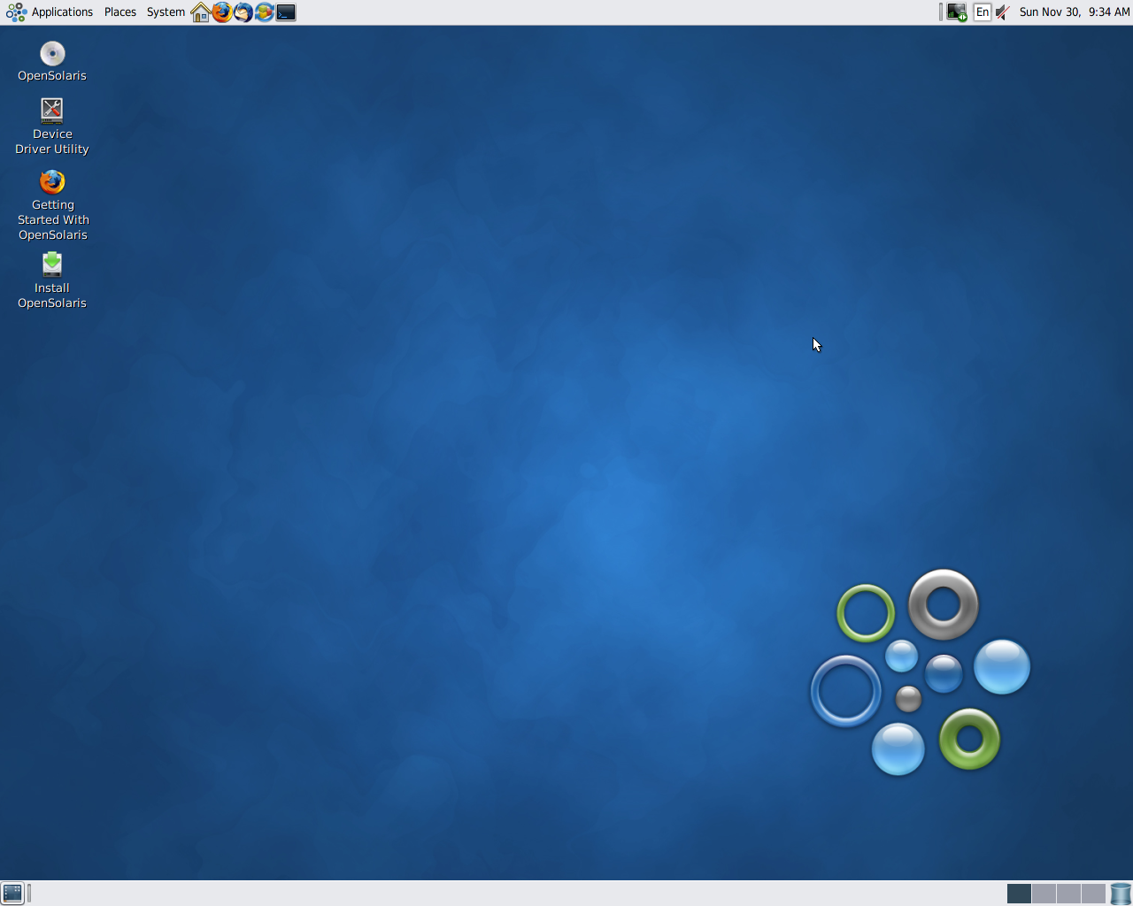 The default GNOME desktop environment in OpenSolaris 2009.06; the OpenSolaris logo, a collection of green, blue, and grey bubbles, is in the corner of the wallpaper.