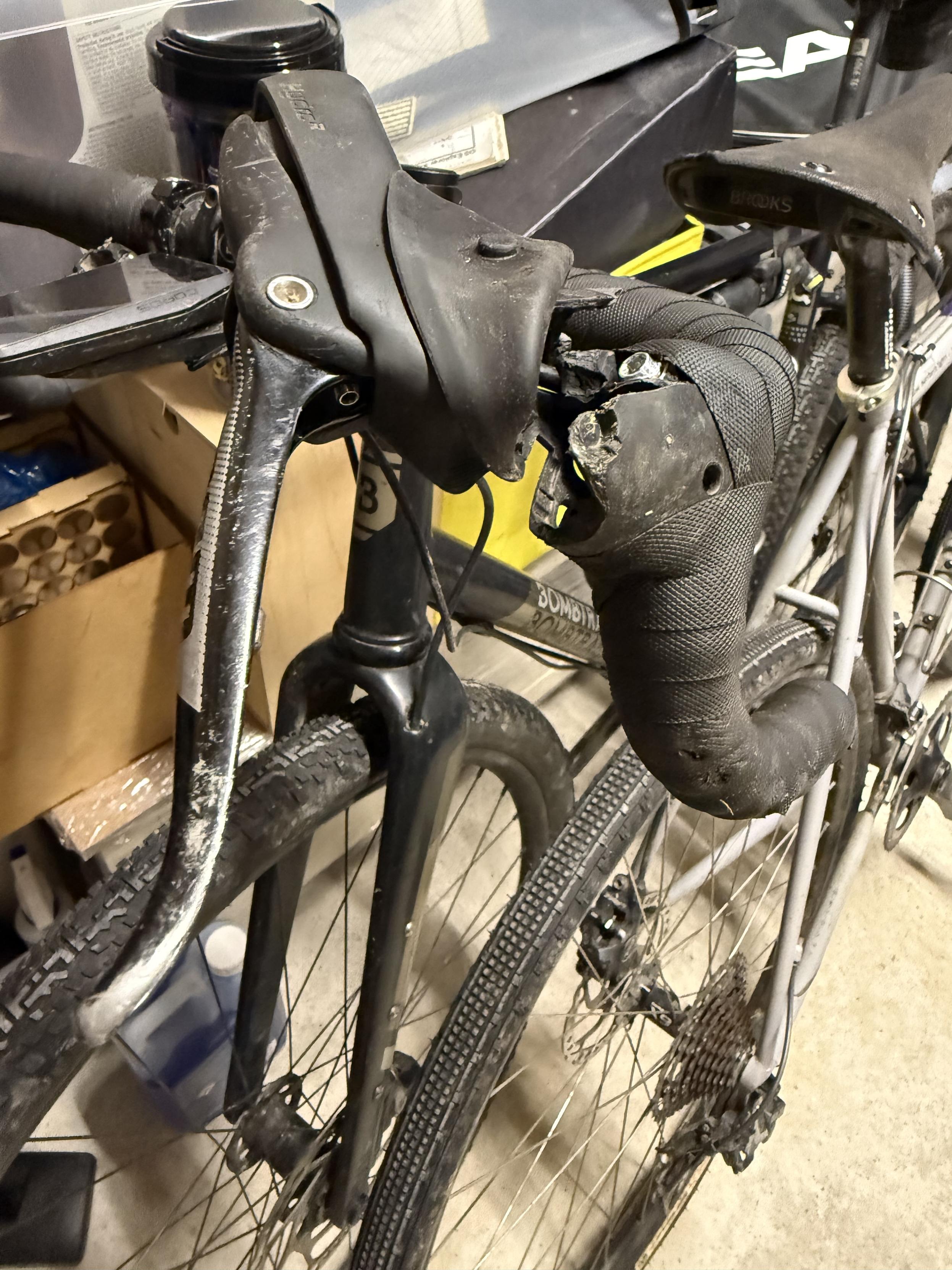 SRAM brake lever snapped off and held in place only by the brake hose