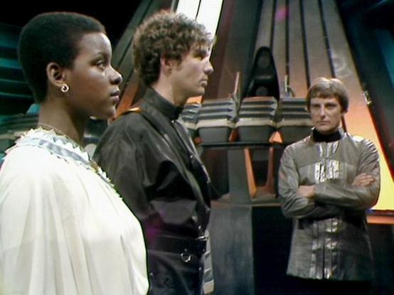 Claude Sonnet 4.0 describes the image as: "This appears to be a scene set aboard a spacecraft, likely the Liberator or Scorpio, featuring three characters in what seems to be a tense moment. The setting shows the distinctive futuristic interior design typical of the series, with sleek walls and technological elements visible in the background. The characters are positioned in what appears to be a confrontational or dramatic scene - one wearing an elegant white outfit, another in dark clothing, …