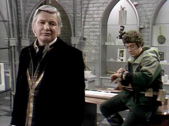 Claude 3.7 describes the image as: "The image shows a scene set in what appears to be a futuristic interior with white brick walls and arched display alcoves. On the left stands an older gentleman with silver hair wearing a formal black coat with decorative gold elements, giving him an authoritative presence. To the right, another person with curly hair sits at what looks like a control panel or desk, dressed in a green outfit and appearing to be working on something.

The setting has a stark, …