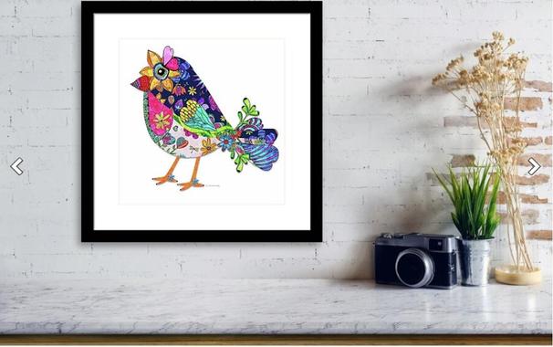 Colorful bird in a black frame.  Hand drawn and painted by artist and poet Sharon Cummings.