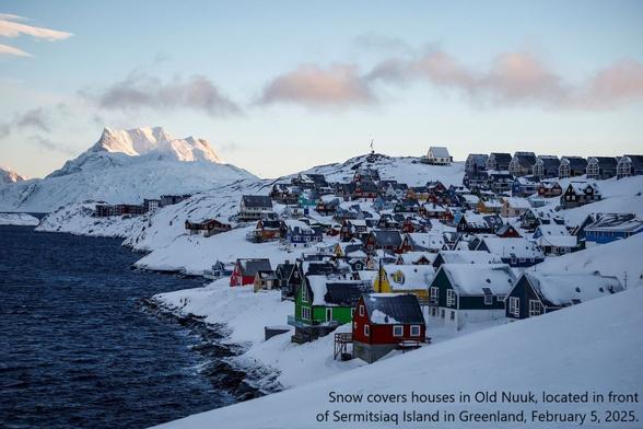 photo - Snow covers houses in Old Nuuk, located in front of Sermitsiaq Island in Greenland, February 5, 2025.