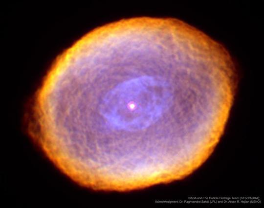 By contrast, evidence indicates that only a few million years ago, IC 418 was probably a well-understood star similar to our Sun. Only a few thousand years ago, IC 418 was probably a common red giant star. Since running out of nuclear fuel, though, the outer envelope has begun expanding outward leaving a hot remnant core destined to become a white-dwarf star, visible in the image center. The light from the central core excites surrounding atoms in the nebula causing them to glow. IC 418 lies about 2000 light-years away and spans 0.3 light-years across. This false-color image taken from the Hubble Space Telescope reveals the unusual details. 

Image Credit: NASA, ESA, and the Hubble Heritage Team (STScI/AURA); Acknowledgement: R. Sahai (JPL) et al.