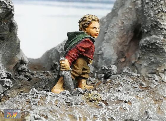 Side view of Bilbo miniature.