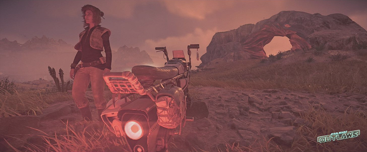 Star Wars Outlaws photo mode screenshot. Looking into the distance, Kay Vess stands near her speeder amidst a vest field. Near her and arch made of rock looks like a gateway into the valley. Hanging from the side of her speeder the helmet of a defeated scout trooper can be seen.