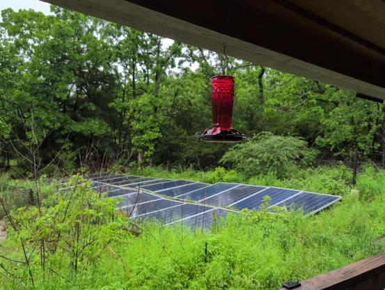 Solar panels harvesting light energy for electricity during a rainy day