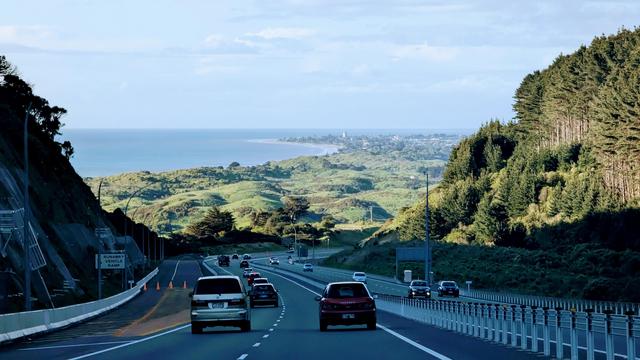 View as we descend north on Transmission Gulley (SH1) with the wonderful coastal view laid out before us.