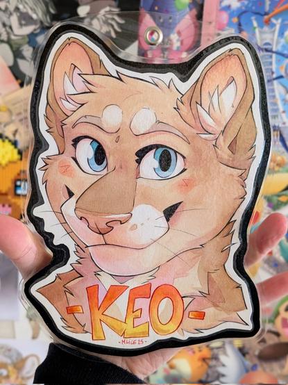Traditional watercoloured conbadge of a Puma character