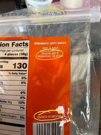 Labeling on the back of a package of dried mangoes from Trader Joe's indicates that they are a product of Peru but we're packed in Mexico and are distributed from California.

This photo copyright 2025 by Maria Langer. All rights reserved. Neither this image nor the accompanying alt text may be used to train AI systems.