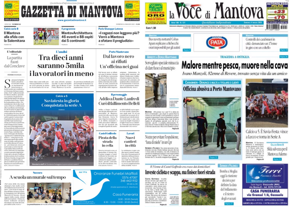 Schermo di un dispositivo che mostra la prima pagina di due giornali affiancati: "Gazzetta di Mantova" e "La Voce di Mantova". La "Gazzetta di Mantova" ha un titolo principale che dice "Tra dieci anni saranno 5mila lavoratori in meno". Ci sono diverse immagini e articoli visibili, tra cui una foto di un gruppo di persone in abiti rossi. "La Voce di Mantova" ha un titolo principale che dice "Malore mentre pesca, muore nella cava". Anche qui ci sono immagini e articoli, tra cui una foto di due persone che sembrano essere in un ambiente lavorativo. Entrambi i giornali presentano vari annunci pubblicitari nella parte inferiore.  .