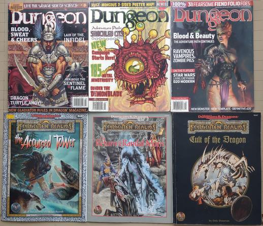 Dungeon Magazine #96: A very buff gladiator in ornate armor stands ready for combat with a short sword and mace.

Dungeon Magazine #97: A cartoony orange beholder with very scary teeth.

Dungeon Magazine #98: A Beautiful woman wearing a skimpy bodice and a plated shoulder and arm guard holds three red arrows in one hand. Her legs are tattooed.

The Accursed Tower: A Drow fights two wolves in an arctic scene.

The Return of Randall Morn: A woman surrounded by a blue aura touches a wizard while a cleric and torchbearer look on in horror.

Cult of the Dragon: A black cover with a circular inset, with an adventuring party taking on an undead dragon. The wizard, fighter, and thief look on as a spellcaster with long red hair puts a lightning bolt into the center of the beast.
