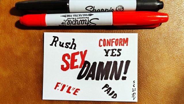 Marker drawing on an artist trading card of a bunch of words apparently stamped from rubber stamps (but really drawn in red and black marker.) The stamps read: File, Rush, Paid, Conform, Yes, Sex, and Damn. The drawing is signed with my "RV" signature glyph and dated 5-5-25. The double-tipped black and red Sharpie markers used to draw the image rest on the table above the card.