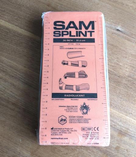 Orange SAM Splint 36" Large with a picture on it how to use it on legs, arms, etc.