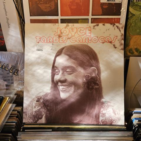 Album cover features a black and white photograph of Joyce. She's smiling brightly, and she has a flower in her hair.