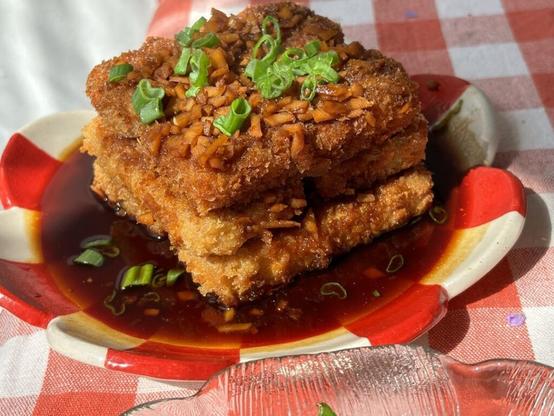 Crispy panko tofu with sautéed snow peas