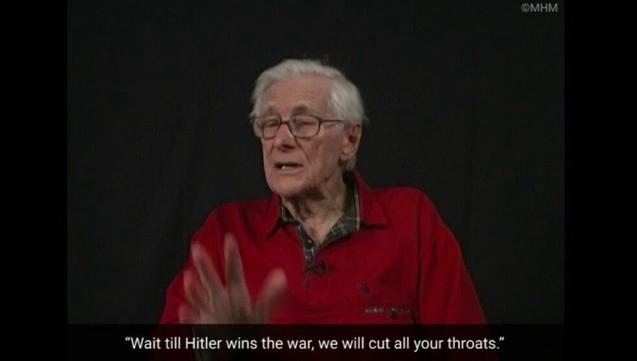 Edgar Lion, age 98, in red, with gray hair and glasses, at a podium, with the quote: "Wait till Hitler wins the war, we will cut out all your throats."