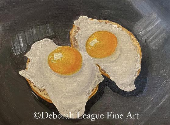 Experience the mouthwatering beauty of this realistic oil painting featuring two fried eggs on toasted bread against a dark, textured background. The rich, glossy yolks and delicate whites are captured with masterful brushstrokes, making this artwork perfect for food lovers, kitchen décor enthusiasts, or art collectors. A true celebration of breakfast!

Two fried eggs rest atop toasted English muffins, capturing the golden yolks' glossy shine. The dark background emphasizes the bright contrast and simplicity of the breakfast scene.