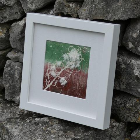 Rose Bay Willow Herb number 1 framed in white and resting against a stone wall