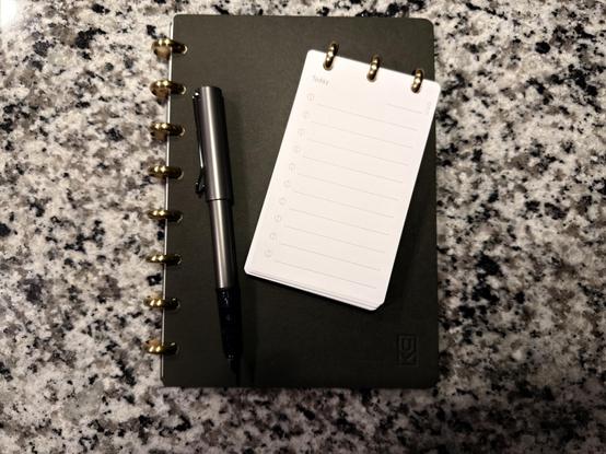 An Ugmonk disk bound notebook and disk bound Analog with a LAMY LX Fountain Pen
