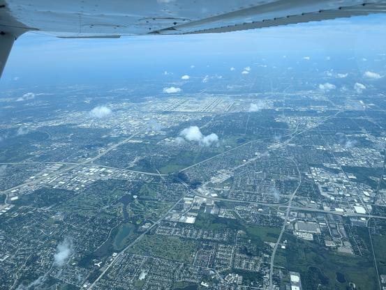 Photo of my least favorite airport that I hate connecting through, Chicago O'hare (KORD) as seen from 10,500 feet.