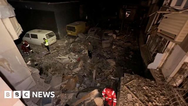 Emergency services work at a site damaged during a Russian drone attack in Odesa, Ukraine, in this screengrab from a video released by mayor Hennadii Trukhanov on Telegram.